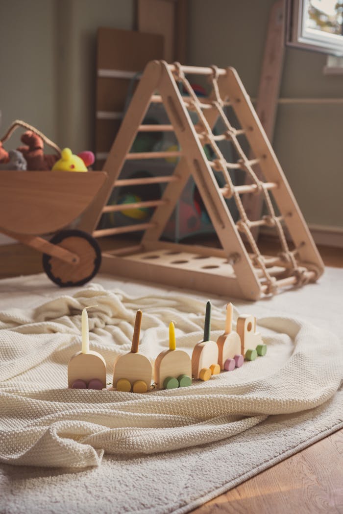 A warm, sunlit playroom featuring wooden toys and climbing frame on a soft rug. Perfect for child development.